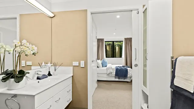 Apt 101 - bathroom and bedroom 