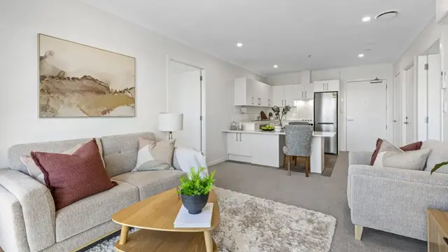 New Lynn apartment lounge and kitchen