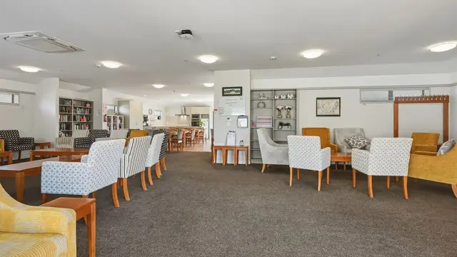Redwoods - community lounge - chair and tables  