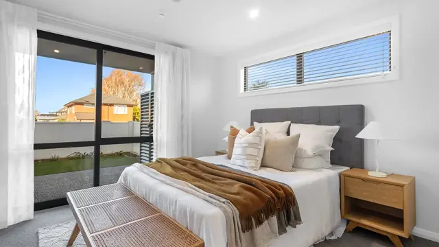 Rangitata apartment - main bedroom with sliding door 