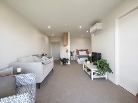 Liston Heights serviced studio apartment - Lounge and bed
