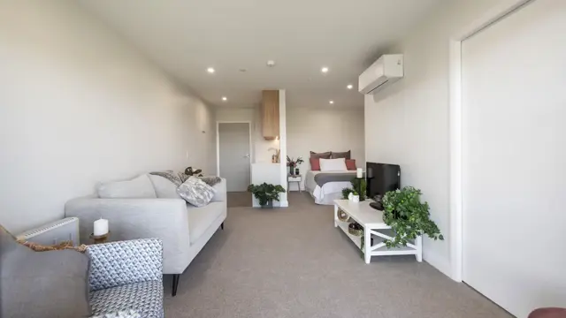 Liston Heights serviced studio apartment - Lounge and bed