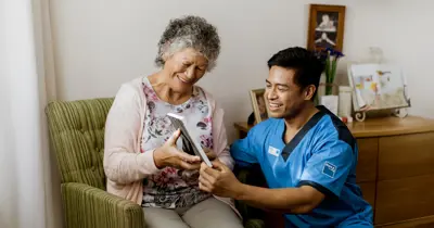 Dementia resident with Bupa Staff