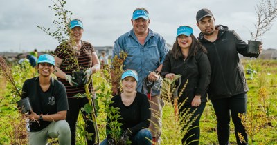 The bupa team at a planting event