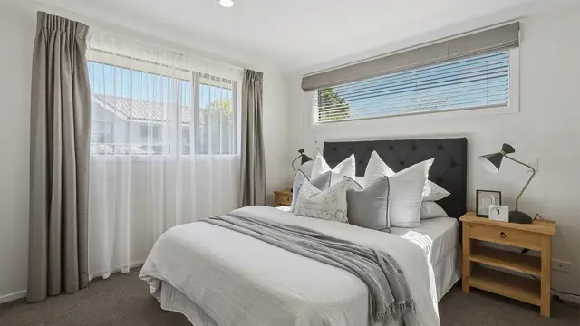 Redwood villa33 - bedroom with bed and side table 