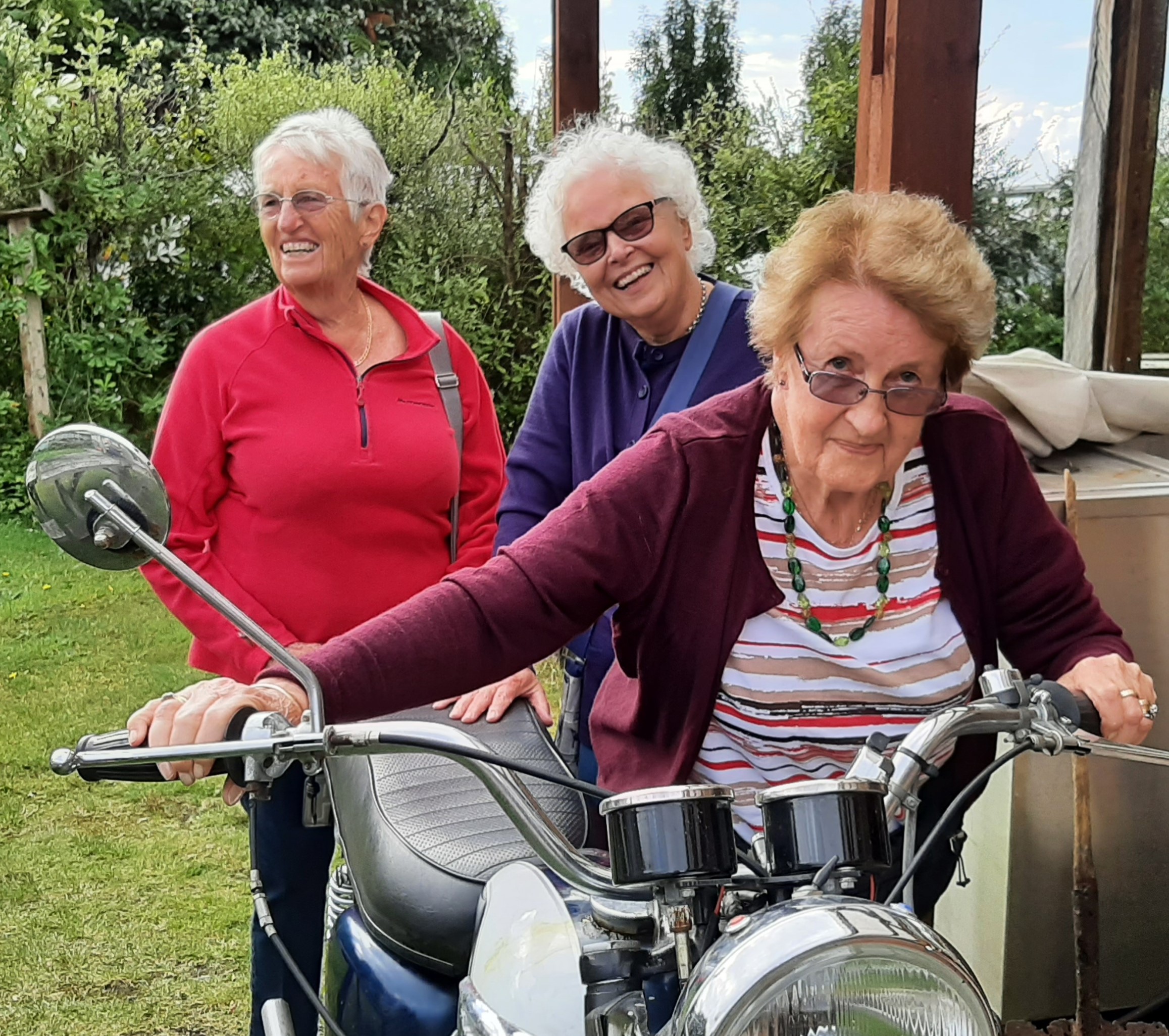 Liz, Gill And Margaret Trying Out A Motorbike At The Empire Hotel In Ross (1)