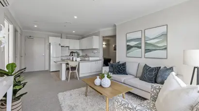 New Lynn apartment lounge and kitchen 