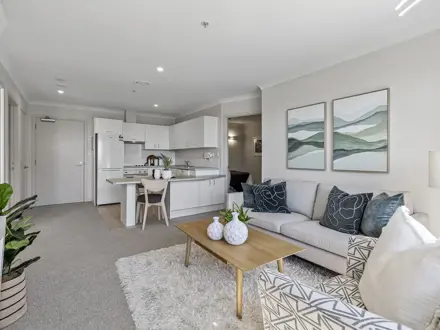 New Lynn apartment lounge and kitchen