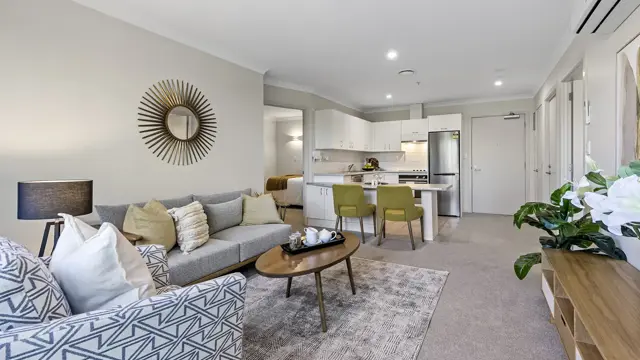 New Lynn apartment lounge and kitchen