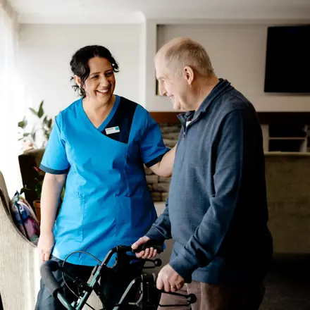 Hospital resident with Bupa staff member