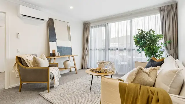 Cashmere View - Apartment 306 living space with couch and chair 