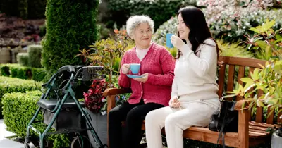 Woman in rest home with daughter