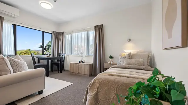 Cedar Manor studio apartment Bed