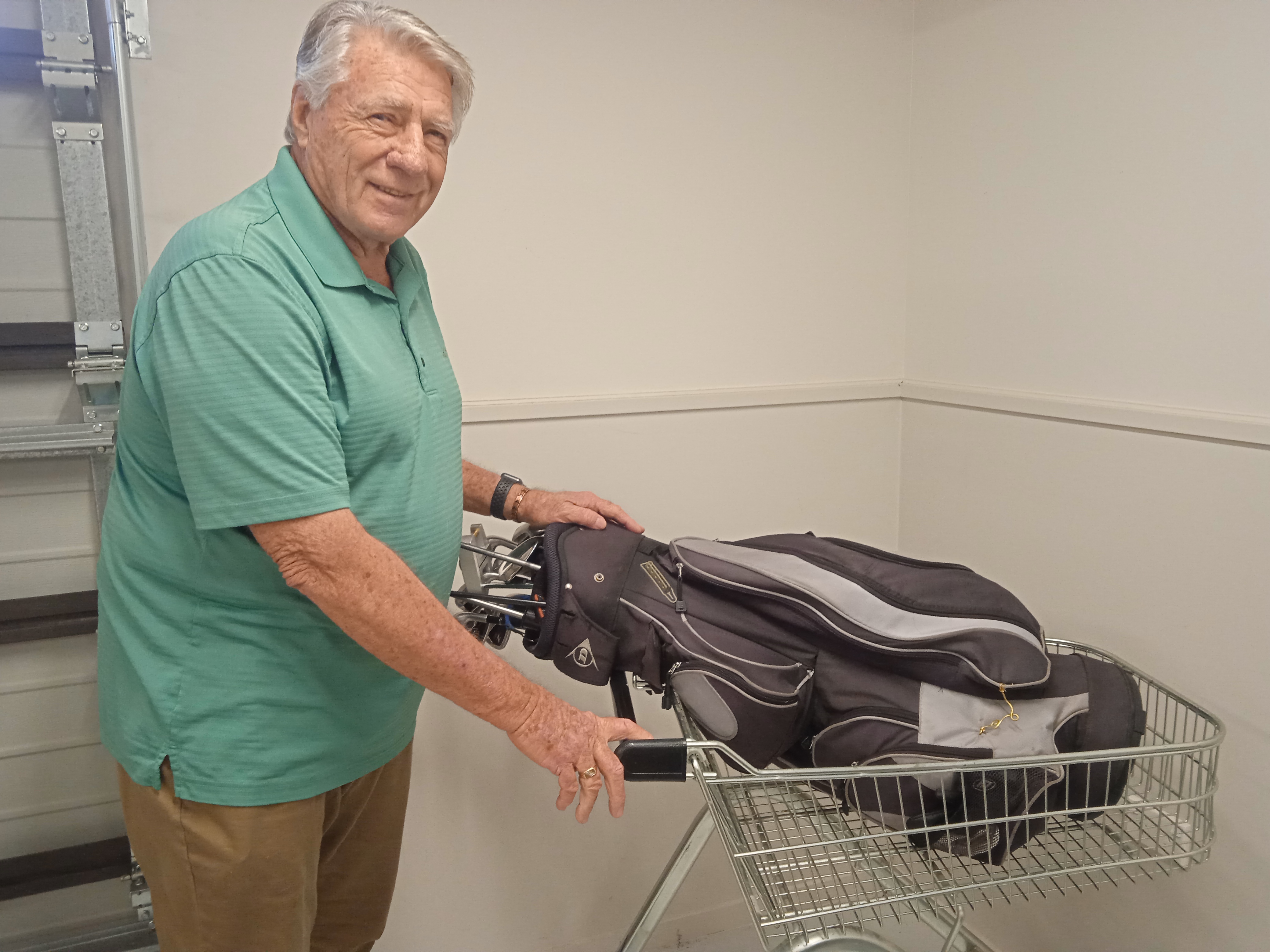 Richard Storing His Golf Clubs