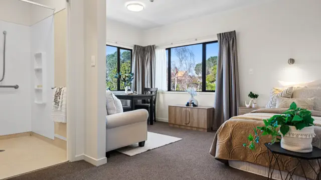 Cedar Manor studio apartment Bed