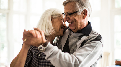 Retired couple dancing