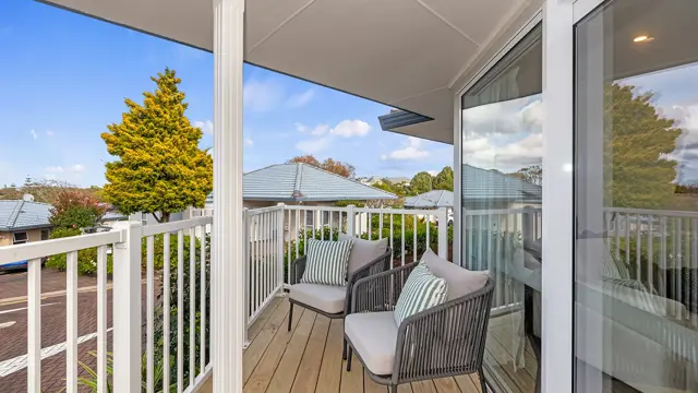 Remuera _ Villa 21 _ deck with chairs