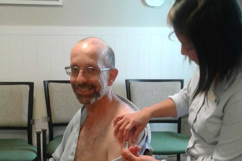 Hammond Williamson Getting Flu Jab