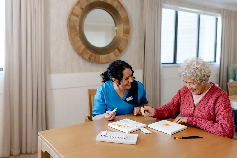 Bupa staff member with care resident activities